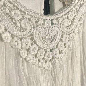 White sleeveless top